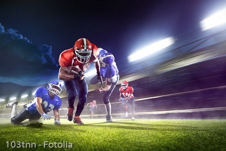 american football players in action on grand arena