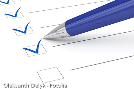 Checklist paper and pen.