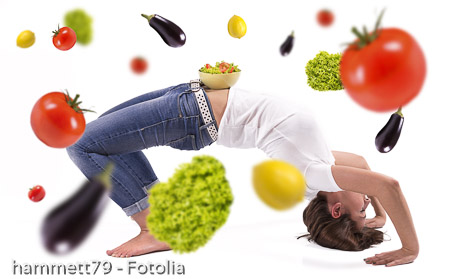 Woman doing gym with vegetables.
