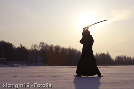 Black oriental martial arts warrior winter training