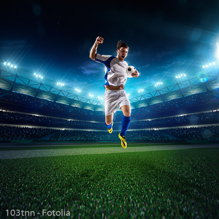 Soccer player in action panorama